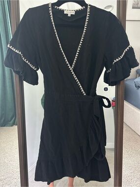 Moon River Black Wrap Dress with White Scallop Trim